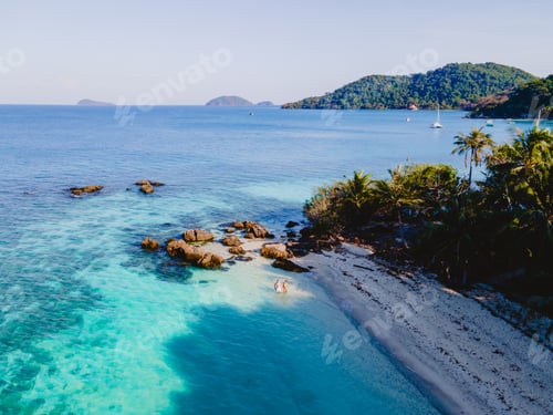 Preview: Koh Wai Island Thailand tropical Island near Koh Chang, couple of men and woman on the beach
