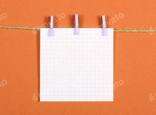 Preview: A Sticker For Notes On A Light Background Is Attached To Small Clothespins