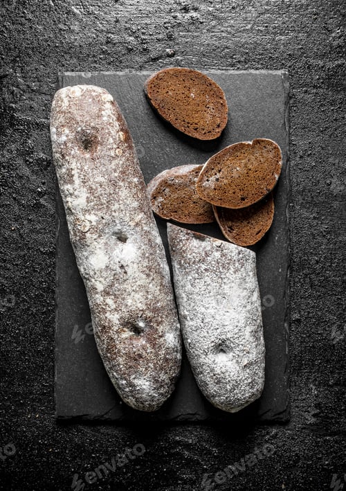 Preview: Sliced rye bread on a stone Board.