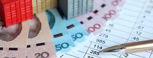 Preview: Company shipping cargo containers in China with yuan money bills and pen