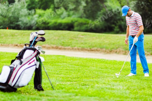 Preview: Golfer practicing and concentrating before and after shot