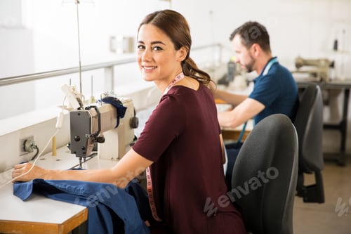 Preview: Seamstress working in textile factory