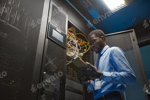 Preview: African American Network Engineer in Server Room