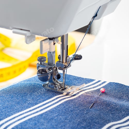 Preview: Sewing machine with striped blue white fabric and thread, home crafting or hobby, square format