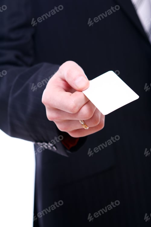 Preview: Businessman holding empty bussines card