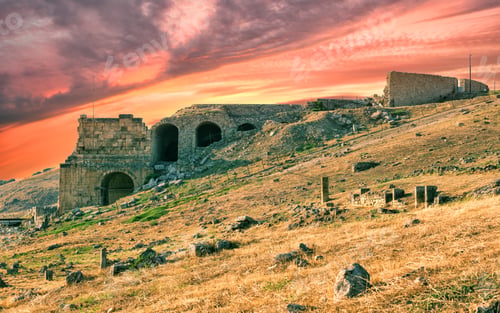 Preview: Antique city of Hierapolis under dramatic sunset sky