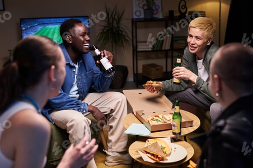 Preview: Young Students Laughing at Party