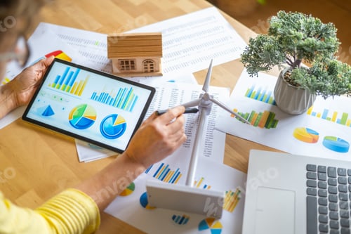 Preview: Businesswoman is analyzing data renewable energy investments for sustainable development
