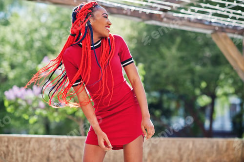 Preview: African american girl in red dress with dreadlocks