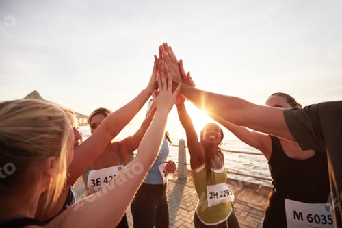 Preview: Marathon runners giving high five
