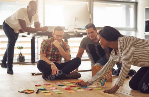 Preview: The team brainstorming while sitting in the office