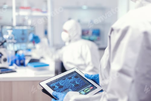 Preview: Biochemist in coverall developing coronavirus cure