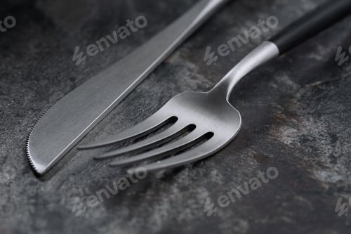 Preview: Silver modern cutlery on stone