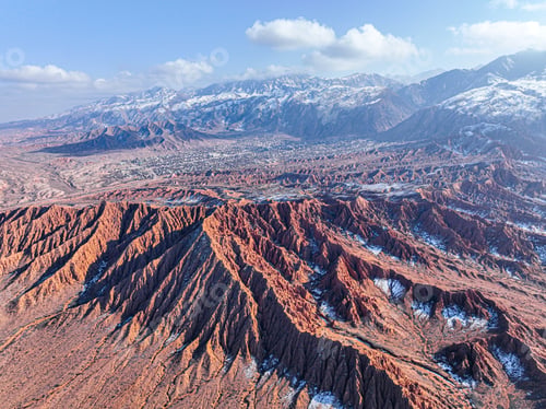 Preview: Wide aerial view of red Mars Canyon and distant town