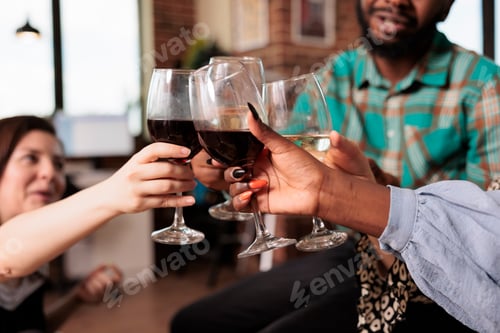 Preview: Various nationalities friends hands closeup shot toasting