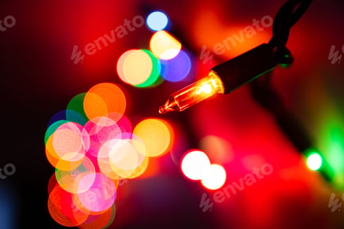 Preview: Closeup shot of Christmas lights with colorful bokeh background