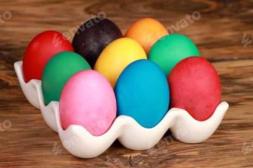 Preview: Colorful Easter Eggs in a White Ceramic Holder