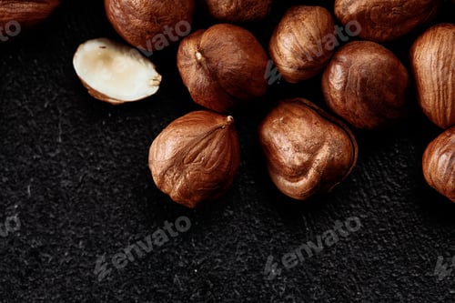 Preview: Close up of Hazelnut kernels - Food Frame Background, macro detailed close up.