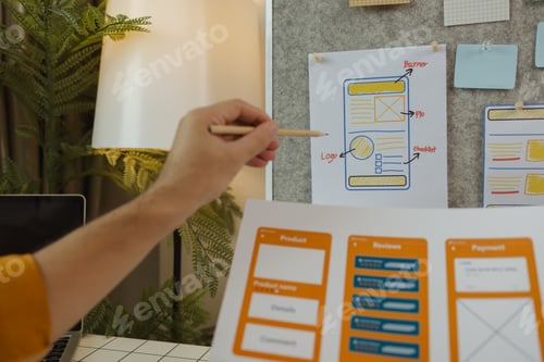 Preview: A web developer, as a User Experience and User Interface Officer, is designing beautiful and easy-to