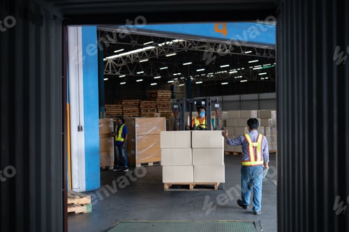 Preview: Forklift truck in warehouse drive in and out steel 40 feet steel container pick up goods boxes