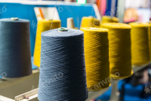 Preview: Spools of color threads closeup, sewing equipment