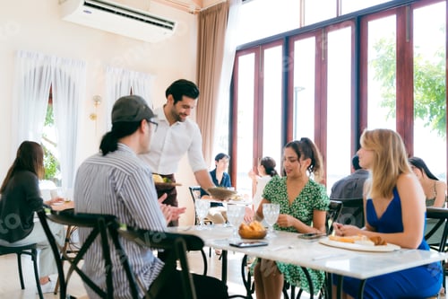 Preview: Waitress man serving food to group of diverse customer in restaurant, eatery client woman