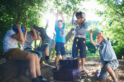 Preview: Young boys dressed as pirates with treasure chest