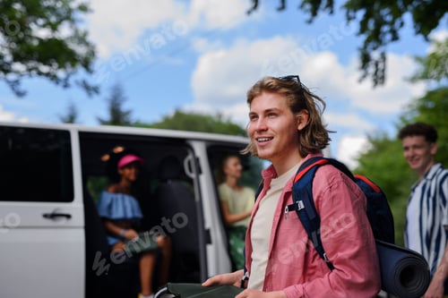 Preview: Multiracial young friends travelling together by car - summer vacation, holidays, travel and road