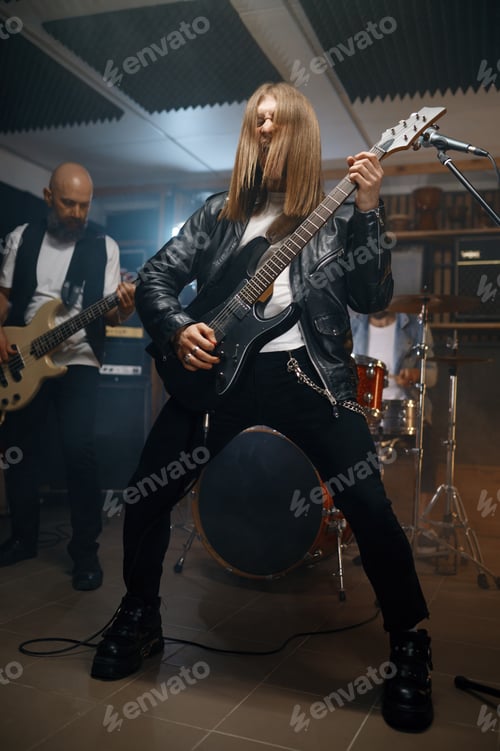 Preview: Repetition of rock music band with handsome bass guitarist playing music