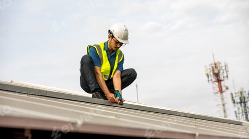 Preview: Engineer working setup Solar panel at the roof top.