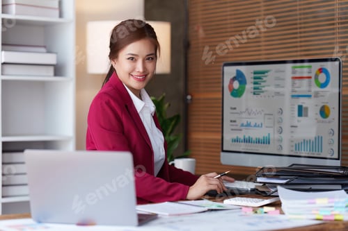 Preview: Accountant woman working on laptop and do document, tax, exchange, research, accounting and