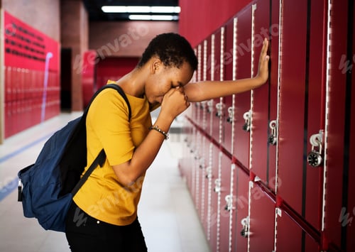 Preview: Young sad student on the hallway