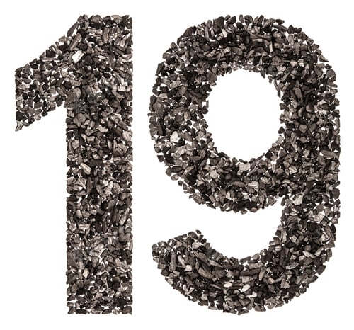 Preview: Arabic numeral 19, nineteen, from black a natural charcoal, isolated on white background