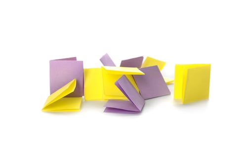 Preview: Colorful paper pieces for lottery on white background