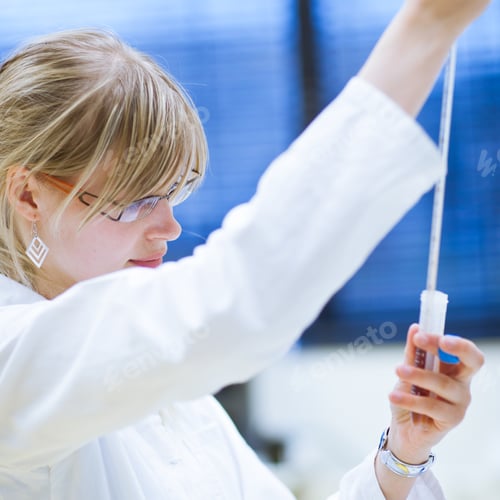 Preview: female researcher carrying out research experiments in a chemist
