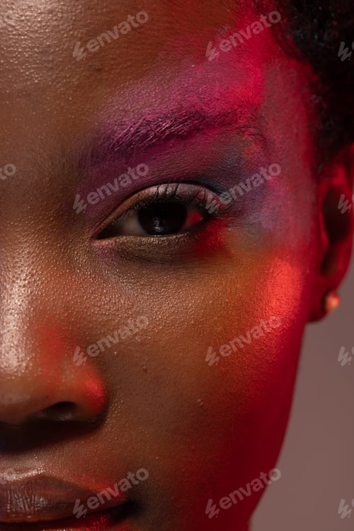 Preview: Half portrait of african american woman with short hair and colourful make up