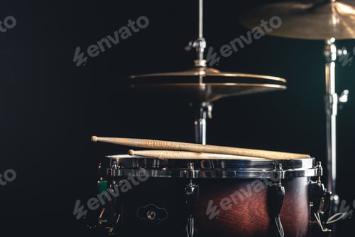 Preview: Snare drum and cymbals on a black background.