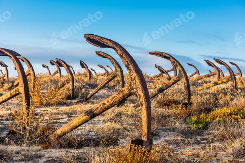 Preview: Cementery of old anchors in the sand of Barril beach in Tavira, Algarve, Portugal