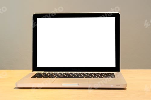 Preview: Mockup of a computer laptop on a desk with a blank white screen.