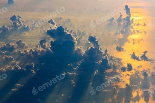 Preview: Beautiful cloudscape from above at sunset.