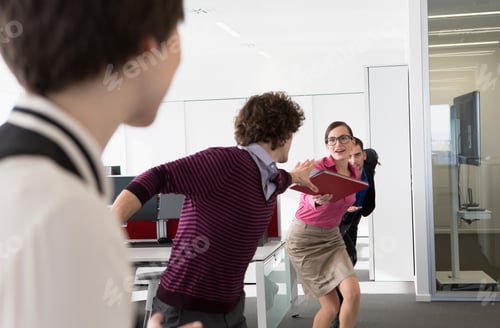 Preview: Office workers having relay race with file