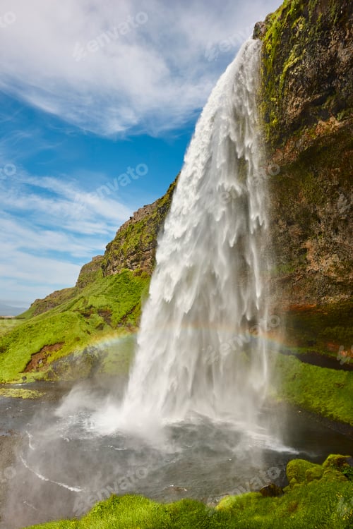 Preview: Seljalandsfoss stunning waterfall and green landscape in Iceland. Landmark