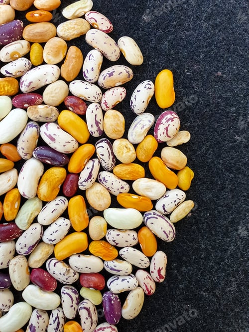 Preview: Top angle shot of scattered of colorful uncooked kidney beans, Scattered of raw kidney beans