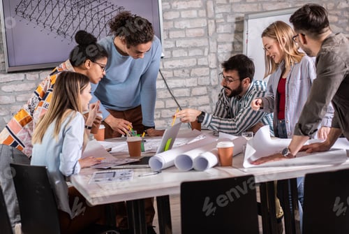 Preview: Group of modern business people discussing architectural designs in the creative office.