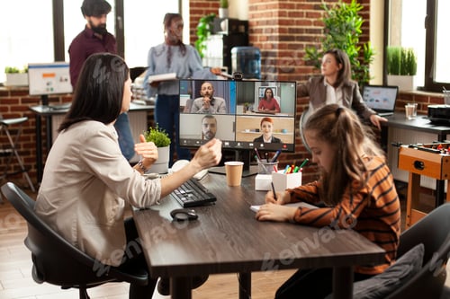Preview: Working mom uses computer for videocall