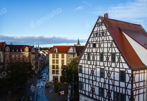 Preview: View of a German old town featuring historic half-timbered buildings, red roofs