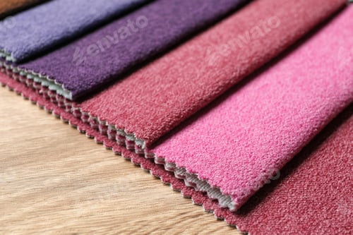 Preview: Fabric samples of different colors for interior design on table