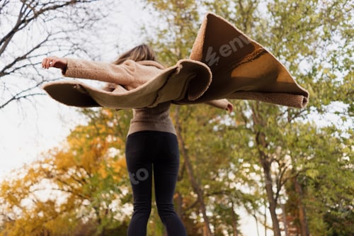 Preview: Woman from the back enjoys nature moving around