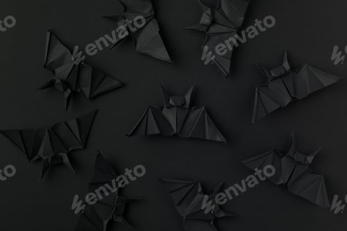 Preview: black origami bats for halloween, isolated on black