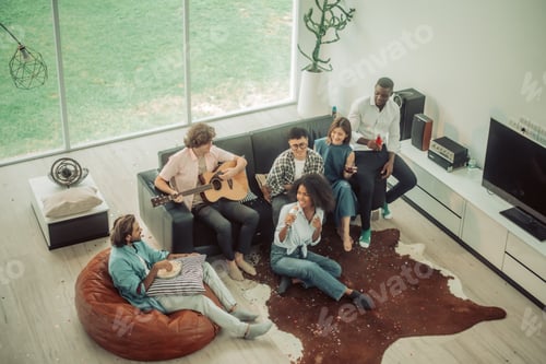 Preview: Lively, diverse friend reunion. Laughter, stories, bonding, music, dance, joyful atmosphere.